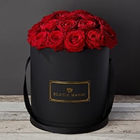 Bloom Magic - Flower Delivery Ireland - This hatbox flower arrangement features stunning red roses immaculately arrange and presented in a choice of either a matte black or pearl white large hatbox. this arrangement is the perfect gift, especially if you are looking for some Valentines flowers to make that someone special feel amazing. We offer same day delivery for this arrangement to anywhere in Dublin, and next day delivery to anywhere in Ireland.