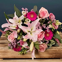 Bloom Magic - Flower Delivery Ireland - In honour of the Rose of Tralee flower festival in Kerry, our team of expert florists has created a gorgeous bouquet featuring large pink roses of the highest grade, mixed with wax-flowers and eucalyptus leaves. This bouquet comes expertly handtied by our experts and would look a treat in your favourite vase!