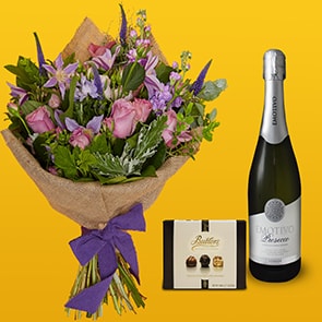 Bloom Magic - Flower Delivery Ireland - This suble and charming bouquet of flowerr, featuring pink roses, veronica and clematis is a perennial favourite with our customers. These flowers tell a love story: soft blues, muted lilacs and deep purples are beautifully combined by our expert florists.