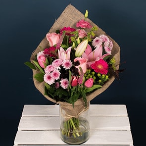 A wonderful bouquet of pink roses and pink lilies presented in an artistic hessian wrap. This bouquet of flowers is available for same-day delivery in Dublin and next day delivery anywhere in Ireland. 

Valentines is very busy and supplies of each product are limited. Order early to avoid disappointment. 

Vase is not included.