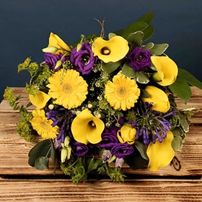 Bloom Magic - Flower Delivery Ireland - A luxury hand-tied bouquet featuring yellow germini, purple lilac and calla lillies. This bouquet of flowers makes the perfect gift for a birthday, thank-you or new baby.
