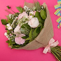 Bloom Magic - Flower Delivery Ireland - You can't go wrong with the Sweet Santa Barbara bouquet. This flower bouquet is always one of our most popular arrangements. Featuring pink wild roses and tender blushes of scabiosa, this carefully hand-arranged bouquet has sweet and romantic feel.