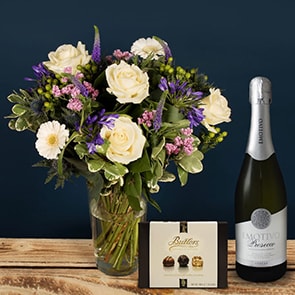 Bloom Magic - Flower Delivery Ireland - A gorgeous hand-tied bouquet featuring pink lillies, pink roses and pink chrysanthemums. This bouquet smells lovely and would be the perfect gift for a new baby or as a romantic gesture. 