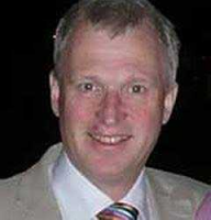 Dr Andrew T Cole