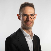 Dr Aaron Hughes
