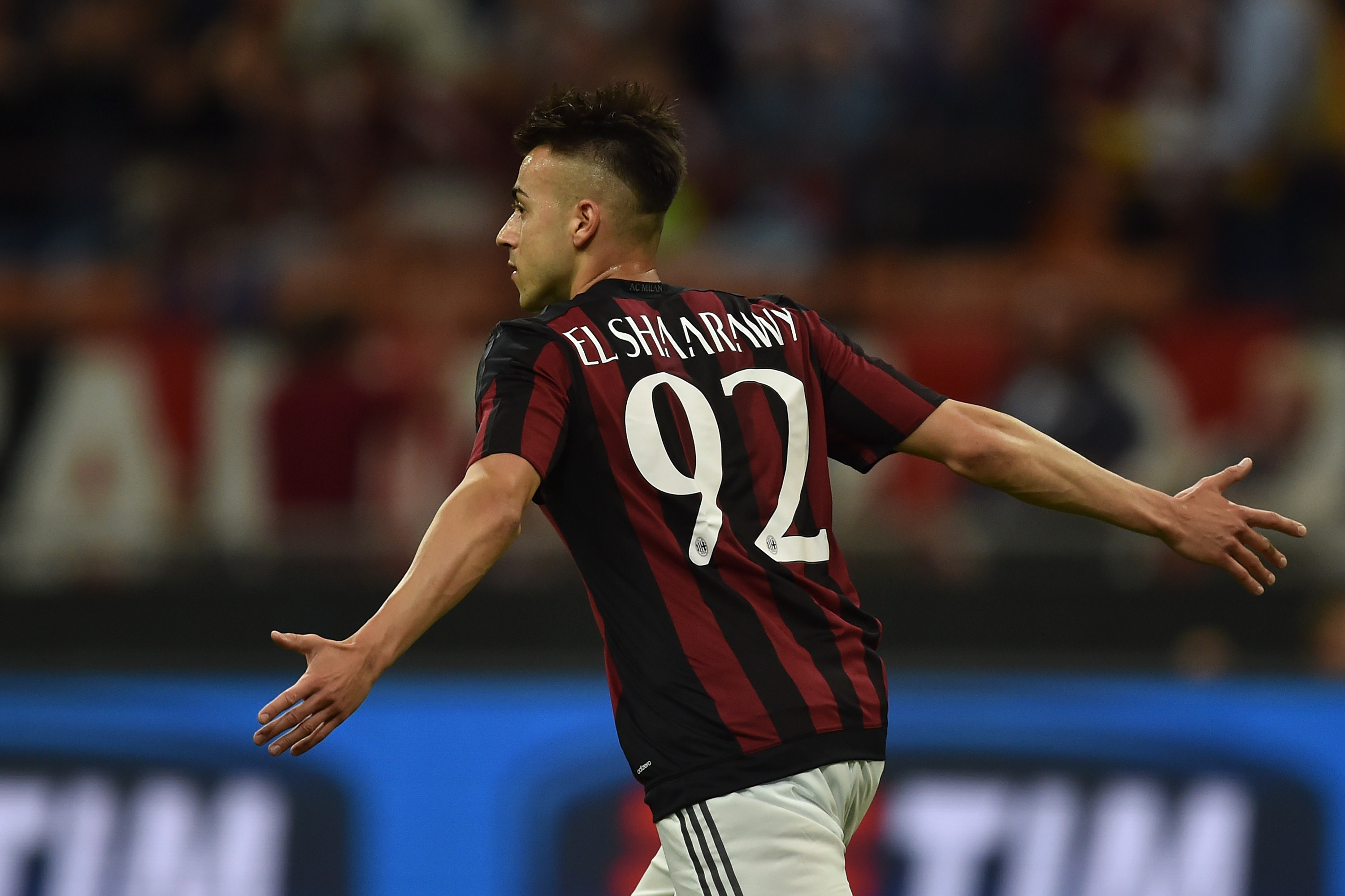 MILAN, ITALY - MAY 24: Stephan El Shaarawy of AC Milan celebrates the opening goal during the Serie A match between AC Milan and Torino FC at Stadio Giuseppe Meazza on May 24, 2015 in Milan, Italy. (Photo by Valerio Pennicino/Getty Images)