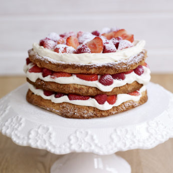 Hazelnut Meringue Layer Cake with Strawberries & Raspberries