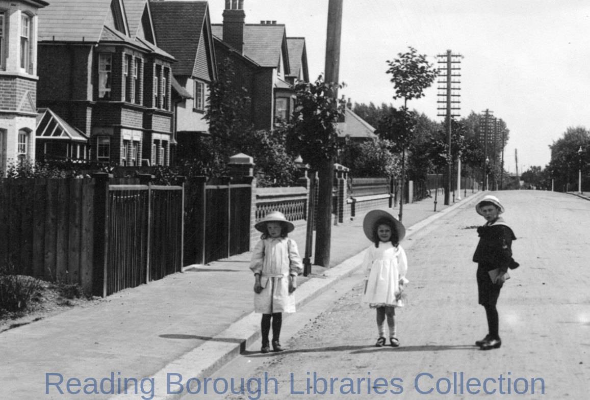 Albert Road, Caversham, looking south-eastwards, 1908. Three children in sun-hats stand in the carriageway Albert Road, Caversham, looking south-eastwards, 1908. Three children in sun-hats stand in the carriageway