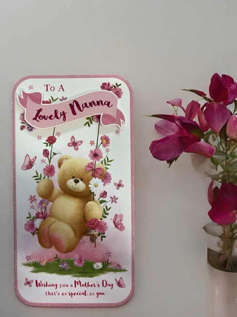 Nanna Mother's Day Card - Bear on Flower Swing with Glitter 9" x 4.75" Nanna Mother's Day Card - Bear on Flower Swing with Glitter 9" x 4.75"