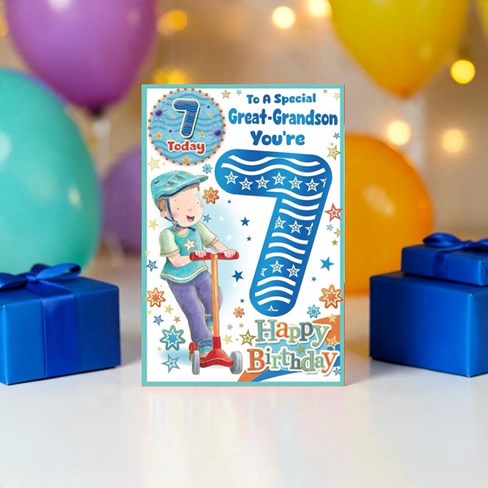 Great Grandson 7th Birthday Card & Badge - Boy on Scooter with Blue Foil 9x6" Great Grandson 7th Birthday Card & Badge - Boy on Scooter with Blue Foil 9x6"