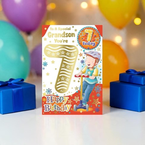 Grandson 7th Birthday Card & Badge - 7 Today Boy on Scooter with Gold Foil 9x6"