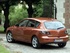 מאזדה 3 2004 - 2009 הצ'בק  -  כתום  - מבט מאחור