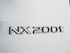 לקסוס NX200t 2015 - 2016 פנאי שטח  -  שנהב לבן  - סמל אחורי