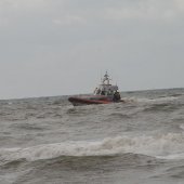 NRB en KNRM assisteren bij aankomst André Kuipers strand Noordwijk