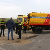 Vrouw in zee gered door KNRM Katwijk