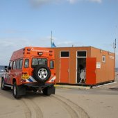 NRB en KNRM assisteren bij aankomst André Kuipers strand Noordwijk