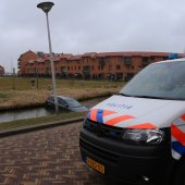 Auto rolt water in Via Antiqua Noordwijkerhout