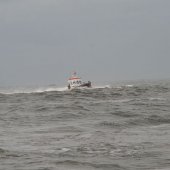 NRB en KNRM assisteren bij aankomst André Kuipers strand Noordwijk