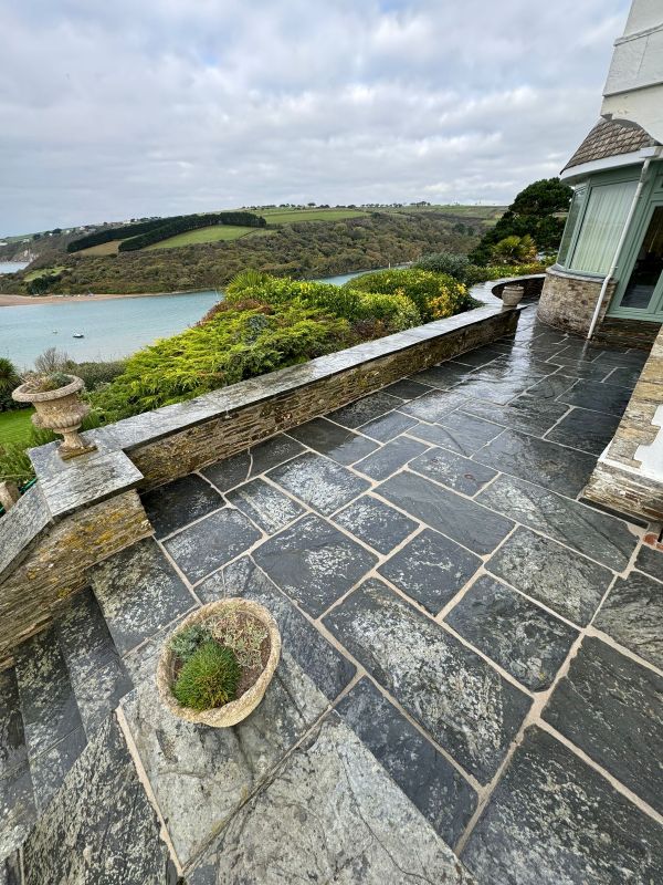 Repointing random-sized joints in random-sized, stone paving 
