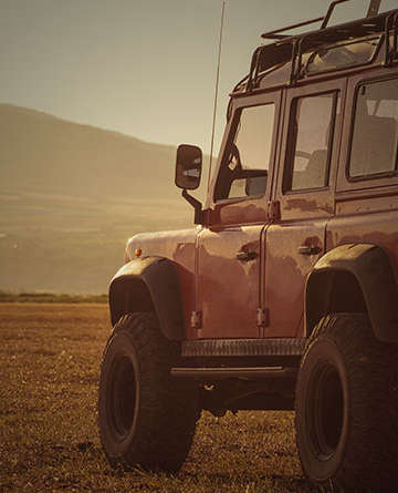 4x4 parked on a field