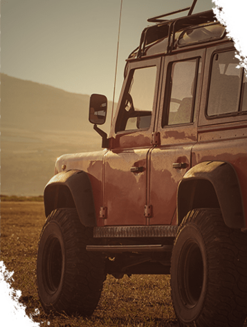 4x4 parked on a field