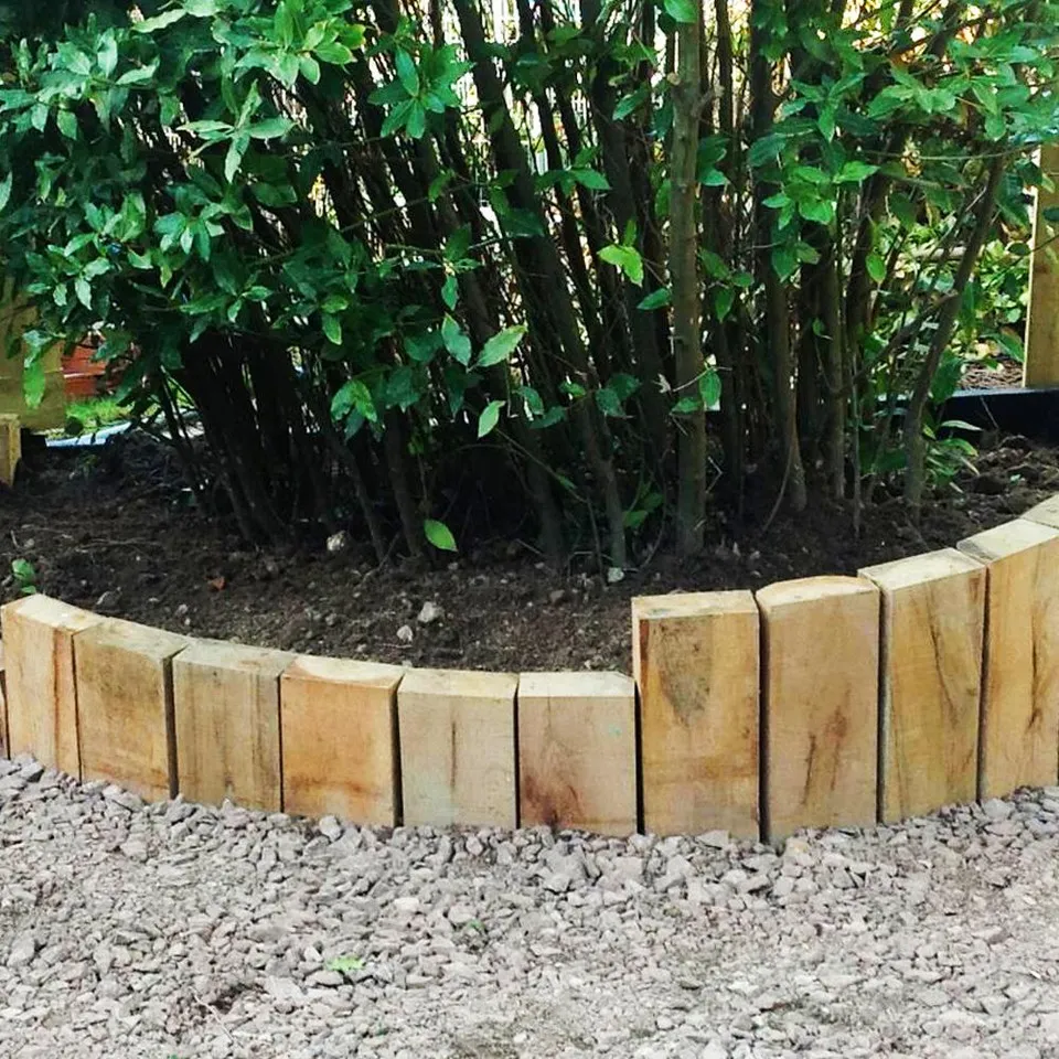 Timber sleepers can often be used for garden edging in gardens.