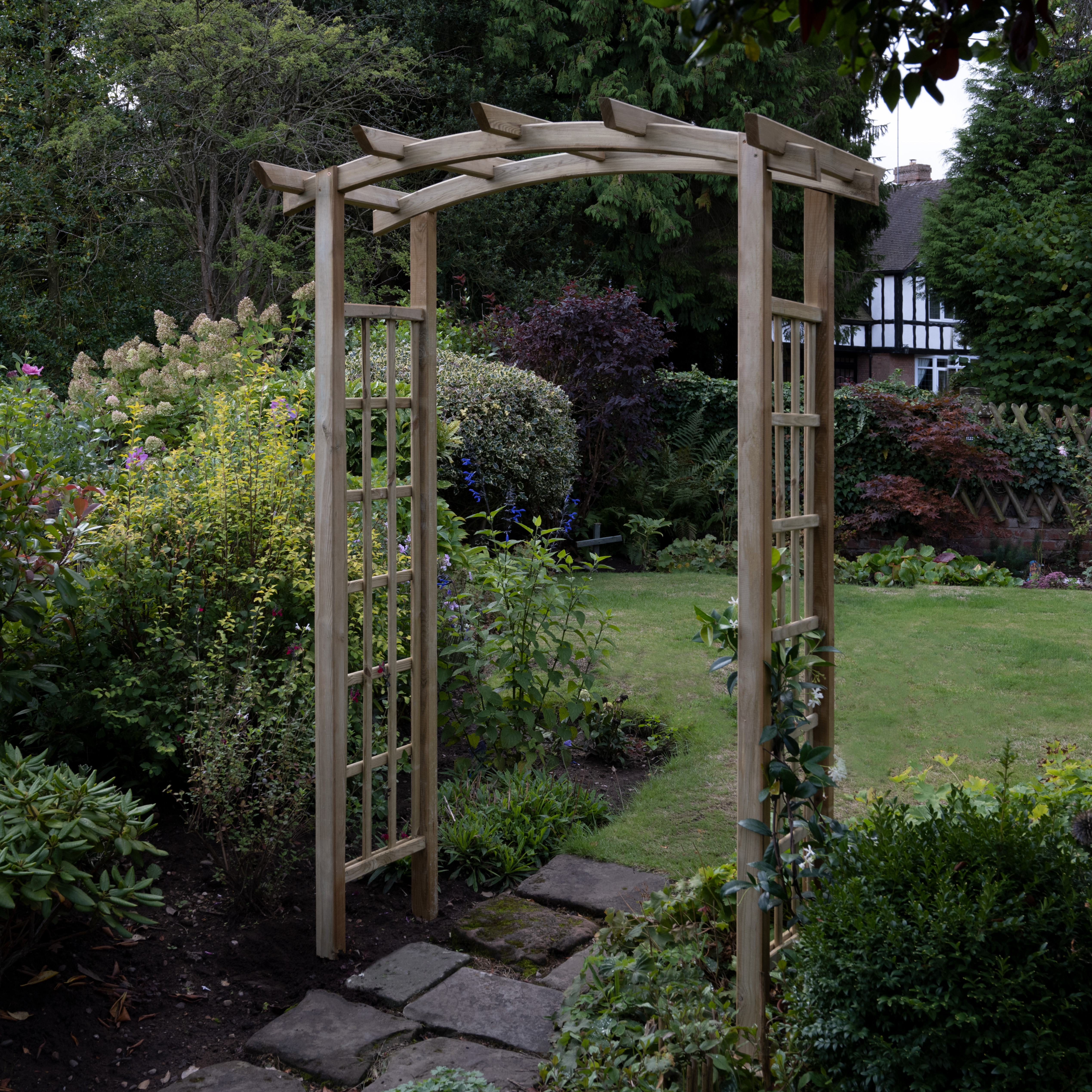 Brick garden paths used in a garden is a cost-effective way of creating paths within a garden.