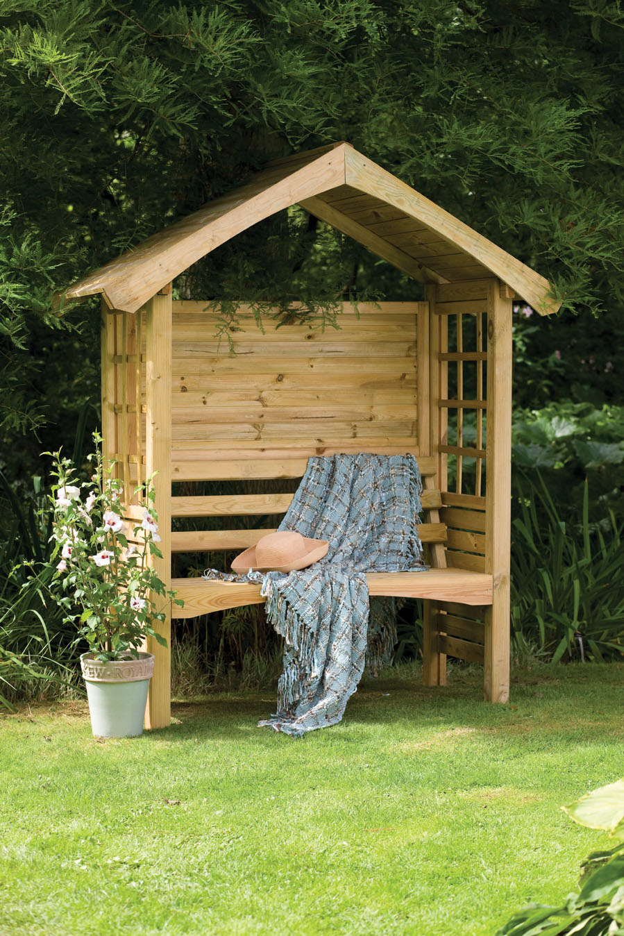 A trellis can be a great natural source for a background of any garden furniture.