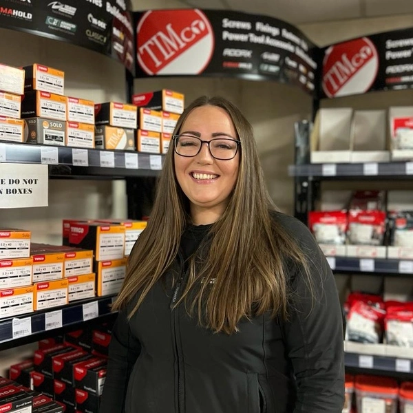 Hayley Parker, our Branch Manager at Manchester, pictured looking smiley in front of some Howarth stock.
