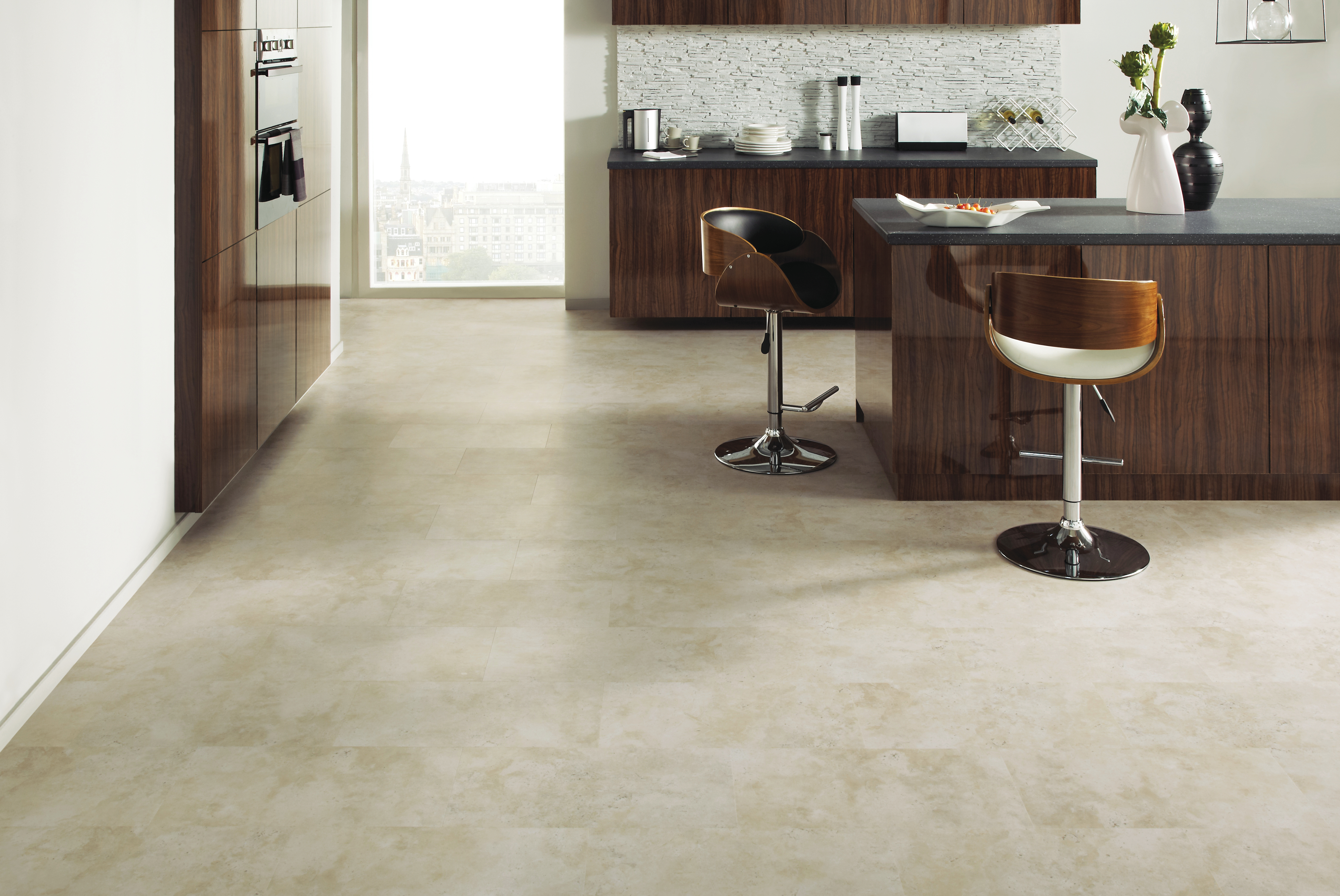 Laminate flooring are water-resistant and suitable for spaces like kitchens.