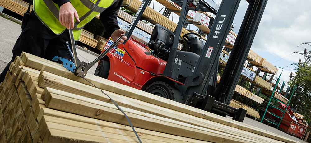 CLS Timber slants lined up outside a building site to be used for a project. 