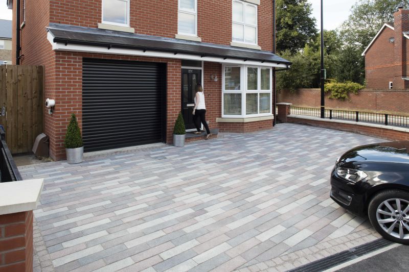 A low brick wall topped with railings is a great option, and is also great for security. 