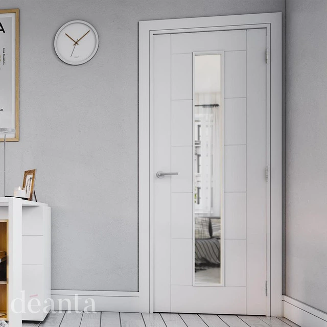 A white internal fire door along the side of a white wall, with a clock on the left hand side. A white internal fire door along the side of a white wall, with a clock on the left hand side.