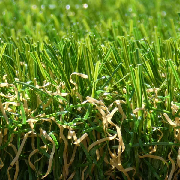 A close up of some lightened artificial grass, which is perfect for low-maintenance gardens. A close up of some lightened artificial grass, which is perfect for low-maintenance gardens.