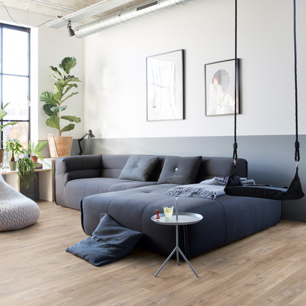 an image of grey painted vinyl flooring, with white walls