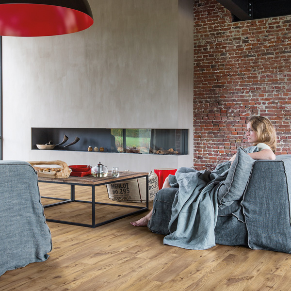 an image of a woman using mop to clean laminate floor