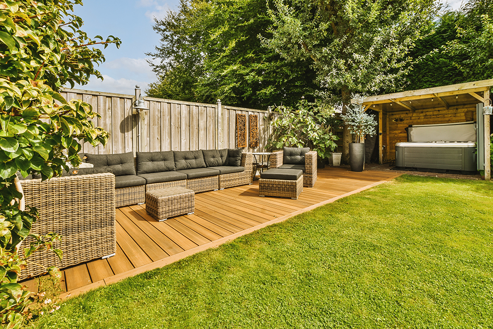 an image of a Lovely garden with a fence in the background