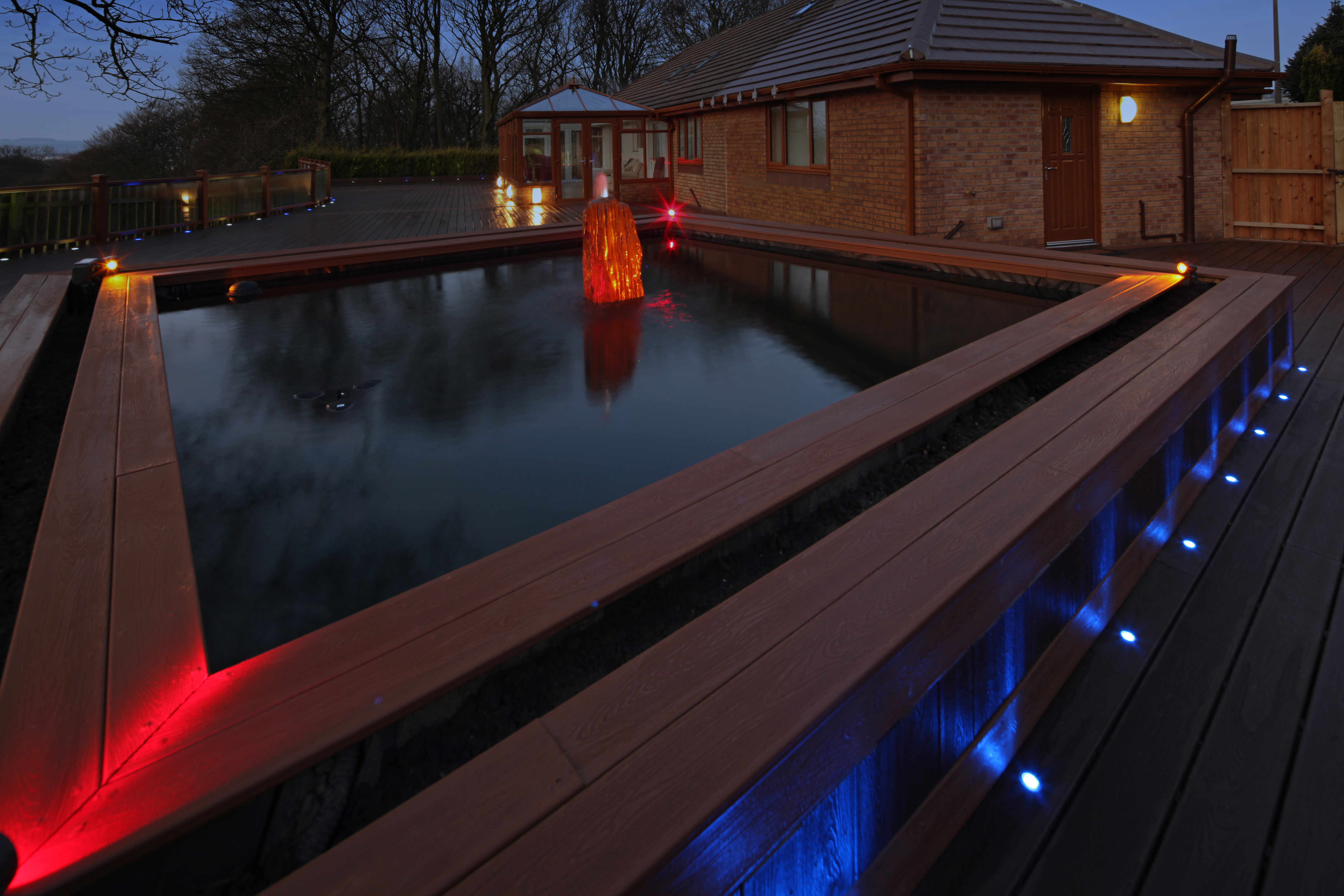 Create a retreat by incorporating a hot tub on top of your decking.