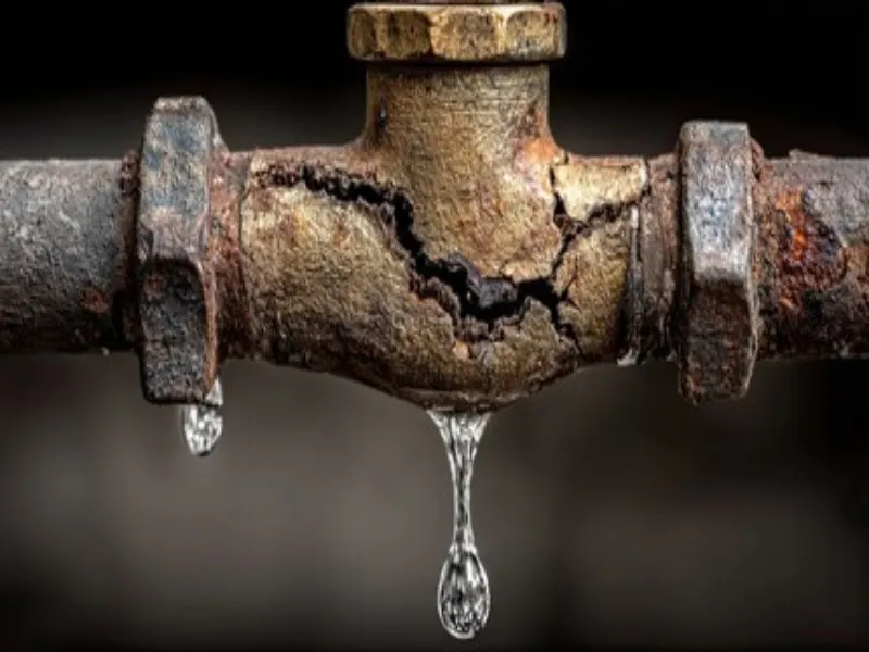 A leaking pipe of water. Water hammer happens when fast-moving water is forced to stop. A leaking pipe of water. Water hammer happens when fast-moving water is forced to stop.