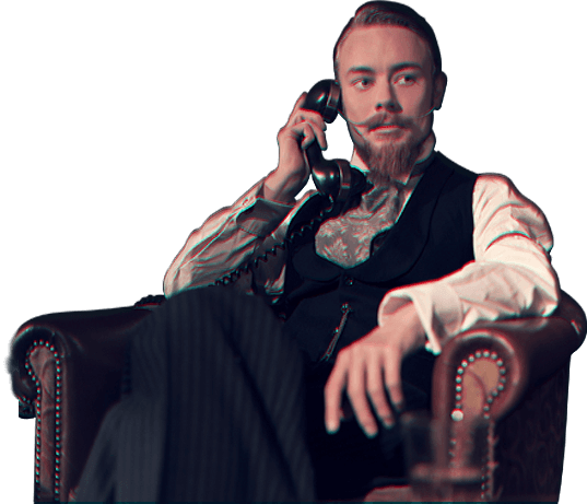 gentlemen sat in armchair on the phone