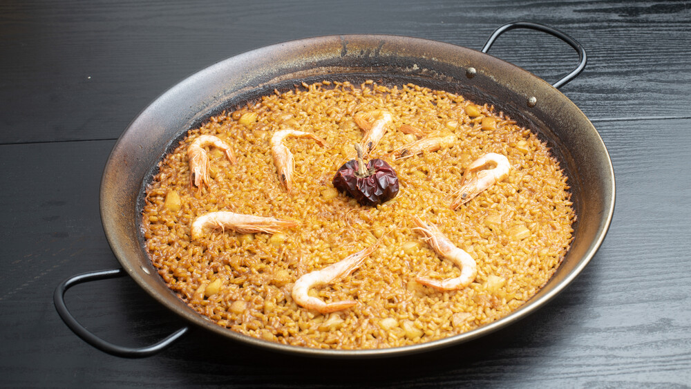 From Humble Beginnings: The Origins of Paella