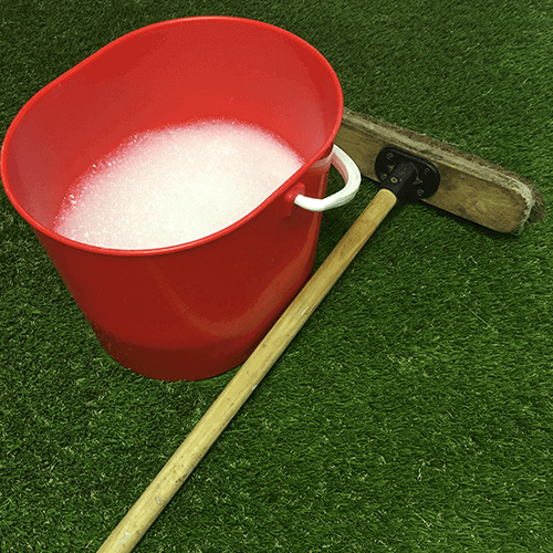 Use a stiff brush to clean away foreign debris