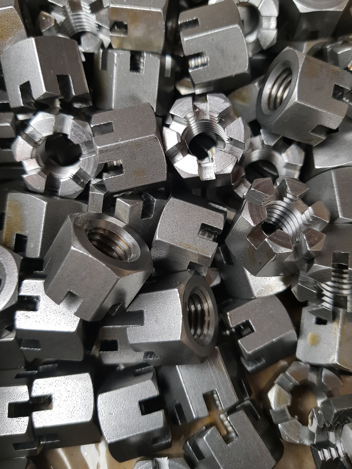 Internally and externally threaded hex, square and round slotted