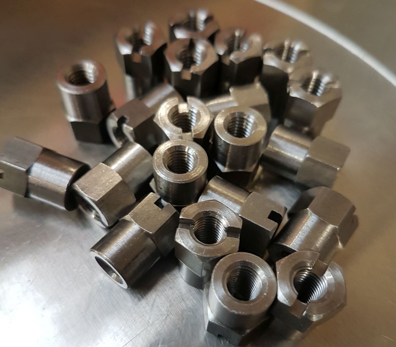 Internally and externally threaded hex, square and round slotted