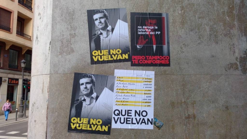 Pegada ilegal de carteles por la zona Centro de Madrid