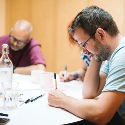 A group of people conducting user research & insight