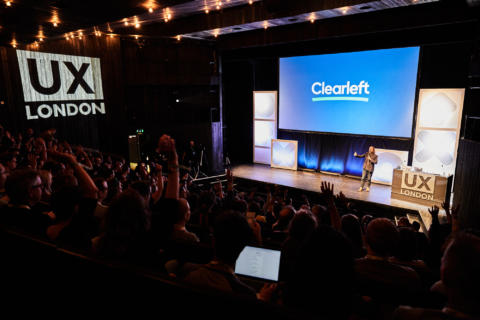 Andy Budd on stage launching UX London 2019