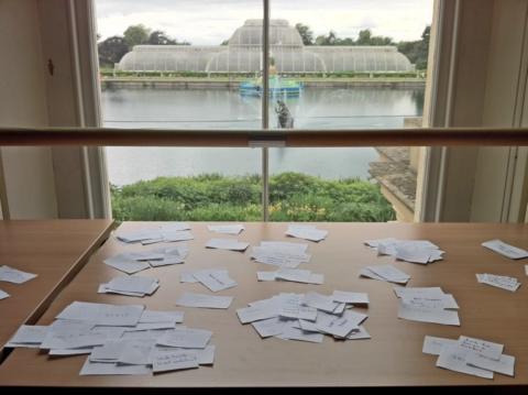 A table covered in cards.
