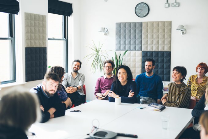 A group of clearlefties sat at the board room table smiling