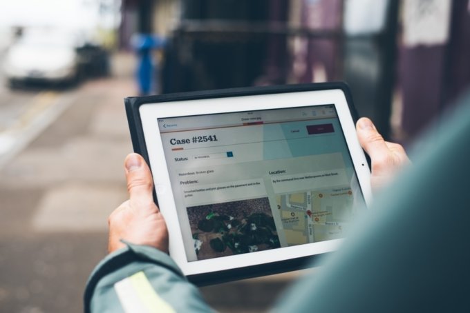 A man using the new Brighton & Hove website on his iPad